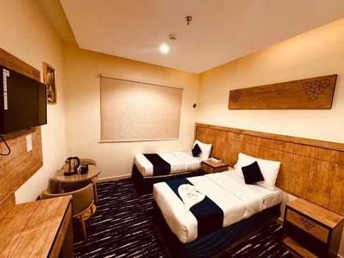 Mecca Hotel | فندق النمارق المتميزة توصيل مجاني للحرم Al Namarq Distinguished Hotel Free hourly shuttle to Al Haram