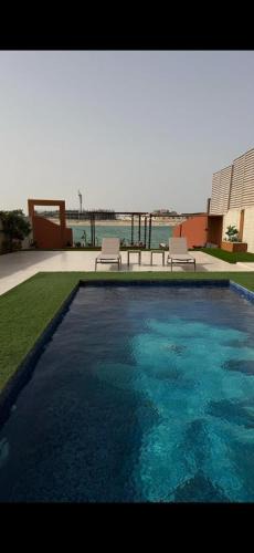 Dhahran Ski Chalet | منتجع شاطئ الدانةAzURE SHELL