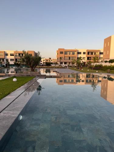 Oulad Azzouz Apartment | Appartement avec vue sur piscine - Opal square Tamaris Dar bouazza
