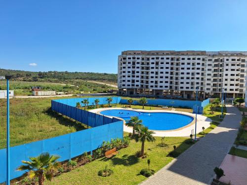 La Nouvelle Ville Ibn Batouta Apartment | Bel appartement climatisé, avec piscine et parking souterrain gratuit, à deux pas de la mer