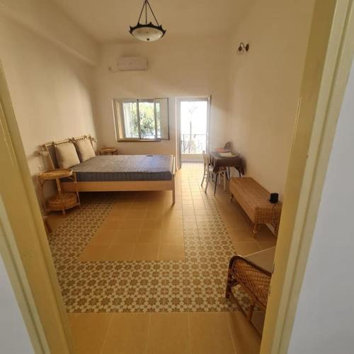 Nachlaot Apartment | Bright, quiet charming getaway ideally located