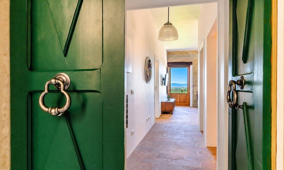 Scrofiano Apartment | Panoramic Views in the Heart of Tuscany, Historic Borgo Apartment with balcony.