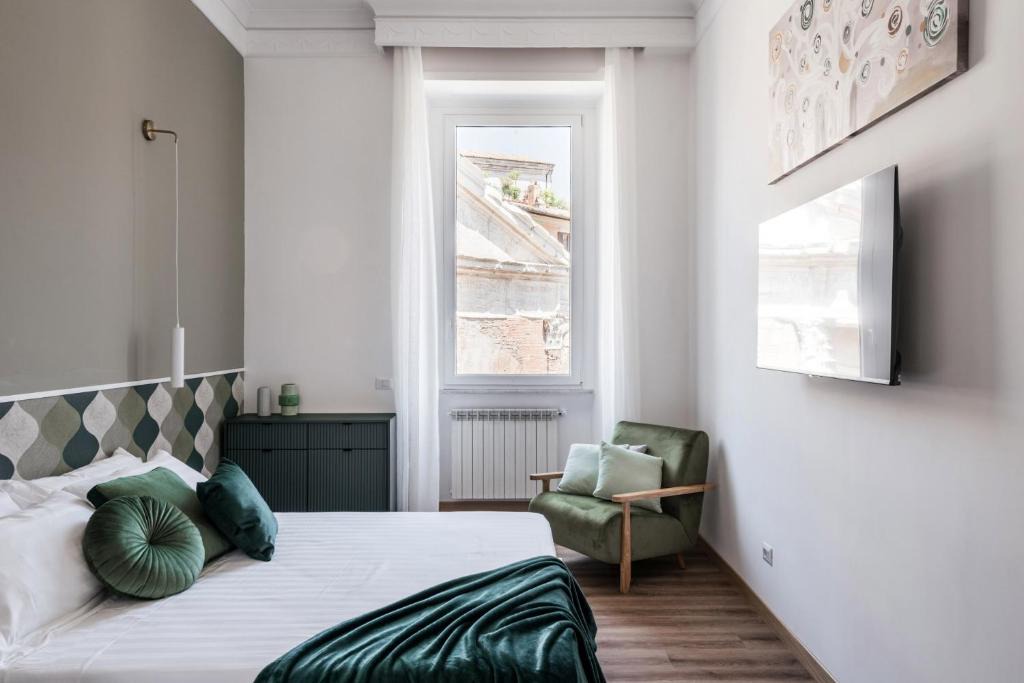 Rione XI Sant'Angelo Apartment | The Best Rent - Three-Room Apartment with View of the Portico d'Ottavia