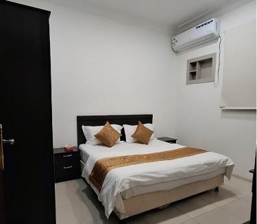 Quai Apartment | أرض الذهب للشقق المخدومة الرويضة