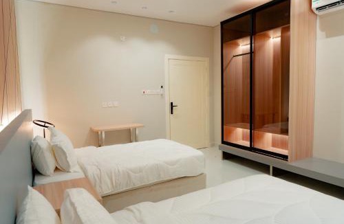 Al Quwarah Apartment | المول سويت شقق مخدومة