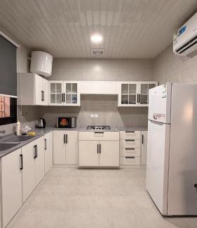 Unaizah Apartment | هوزان للإقامة b12 - شقة بدخؤل ذاتي غرفتين نوم وصاله معيشة