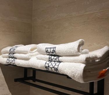 As Salam Apartment | A suite with a room and a lounge with a quiet and modern design