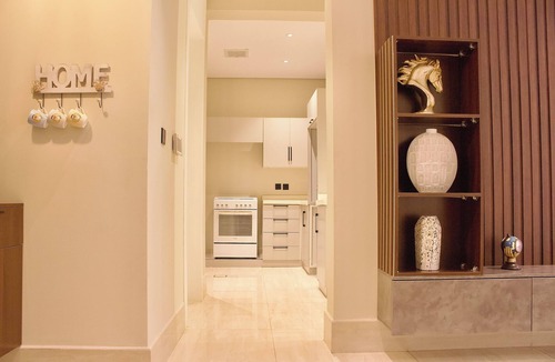 Al Aqiq Apartment | A2-Elegant High-Rise with Warm & Inviting Decor