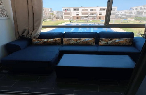 El Mansouria Apartment | Beach Escape: Pool View 2 Steps from the Beach