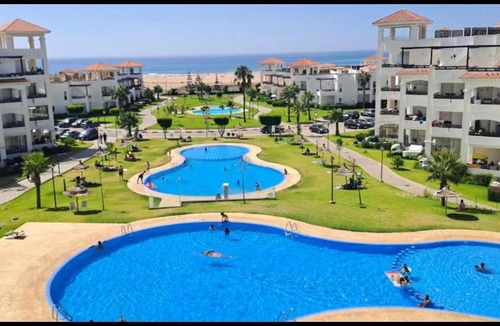 Asilah Beach Apartment | Beachfront Apartment in Assilah, Private Solarium, 4 Pools, Secure Residence, WiFi, Parking