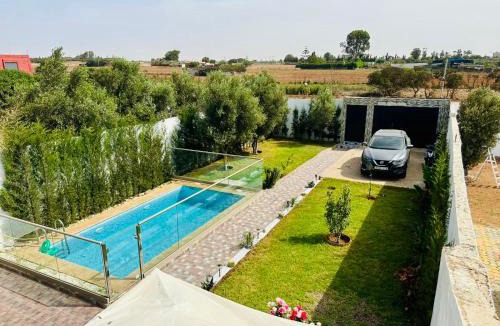 Oulad Azzouz Villa | Belle maison avec piscine à 7 min de la plage en voiture