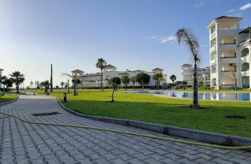 Asilah Beach Apartment | BERALMAR RESIDENCE Privée en terrasse rez-de-jardin pied dans l'eau Chez FAOUZIA