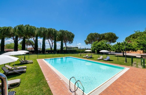 San Martino in Campo Apartment | Bright apartment of approximately 60 sqm, ideal for 4 people, located on the first floor of a building without an elevator.The property is located in a quiet and pleasant setting, with a large shared garden, a shared swimming pool, a BBQ area, and a rese
