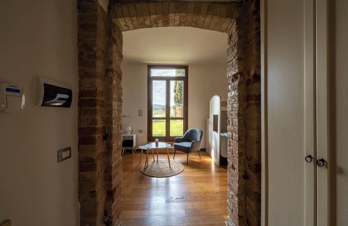 Brufa Apartment | Bright apartment in farmhouse with pool and view of Assisi