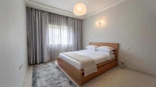 Cite Al Mohammadi Apartment | Bright & Cozy Apartment 10 min Beach