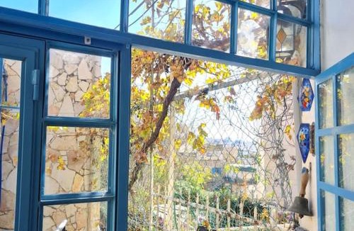 Nachlaot Apartment | Bright, quiet charming getaway ideally located
