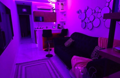 Riyadh Apartment | Chic 1-bedroom living room kitchen small garden. with WiFi, AC in Riyadh