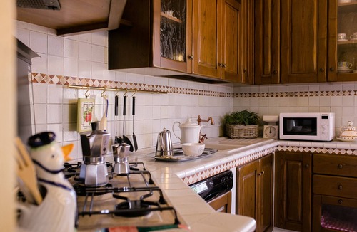 Cortona Villa | Corte della Luna, elegant villa with swimming pool surrounded by a suggestive olive grove