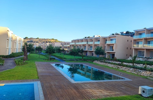 Tamrhakht Apartment | Cozy 1 bedroom apparemment with private terrace, golf and ocean view