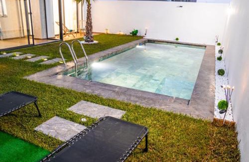 Oulad Azzouz Apartment | Dar Bouazza Luxury apartment with pools garden sports courts parking near the sea Rental is only for married couples, not for unmarried individuals