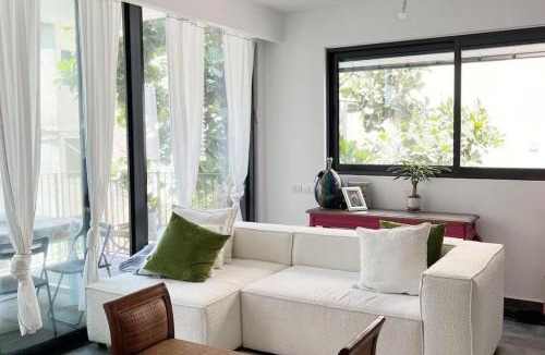 Kerem HaTeimanim Apartment | Enchanting Apartment with Pool, Steps from the Beach Bomb Shelter