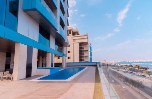 Al Hoora Apartment | Golden Bay: Sea & City Escape
