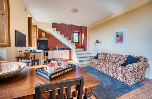 Fratticiola Selvatica Apartment | GuestHost - Elegant 87 sqm apartment in a renovated farmhouse, nestled in the Umbrian countryside. Ideal for 4 people, it offers a shared saltwater pool and an uncovered parking space. Perfect for those seeking relaxation and tranquility, surrounded by b