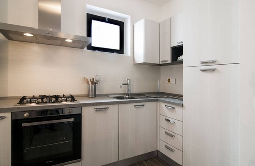 Centro Giano Apartment | GuestHost - Comfortable apartment located on the seventh floor of a modern residence equipped with a lift.In 40 square meters of space it comfortably accommodates 2 people with a double bedroom.Located in the Fonte Laurentina district, near the ring road