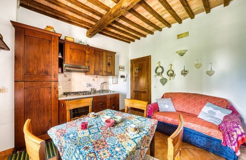 Passignano sul Trasimeno Apartment | GuestHost - Cosy flat equipped with all comforts to comfortably accommodate up to 3 people. The accommodation is located in a renovated former oil mill, which offers its guests numerous shared facilities: access to the seasonal swimming pool, green area