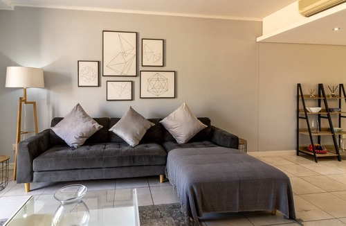 Victoria and Alfred Waterfront Apartment | Opening into a balcony with garden views, the air-conditioned 2bedroom apartment
