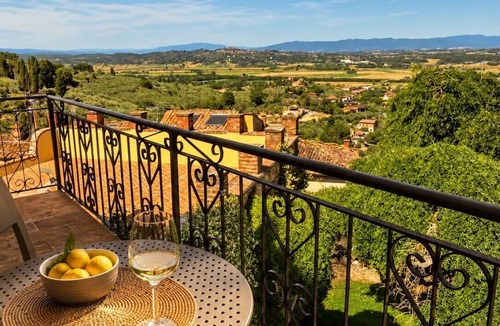 Scrofiano Apartment | Panoramic Views in the Heart of Tuscany, Historic Borgo Apartment with balcony.