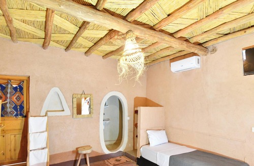 Tarmigt Bed & Breakfast | Room with garden and private terrace in the heart of the palm grove