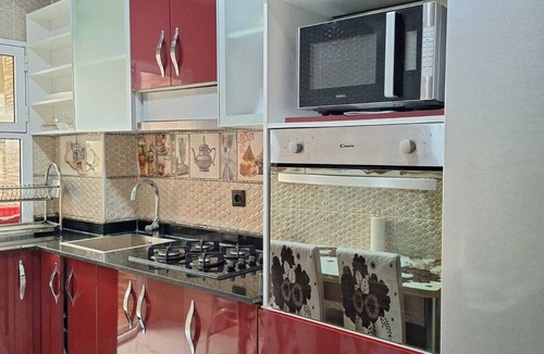 Mesnana Apartment | Secure family haven with Wi-Fi and amenities