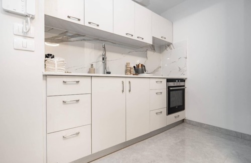 Mea She'arim Apartment | Splashy 1 Bedroom on Haneviim Street in City Center with Private Heated Pool