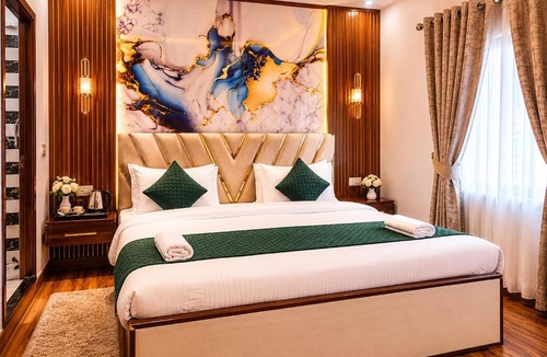Sigra Hotel | The Hotel Atlantis Suites Sigra Road Near Vishwanath Temple