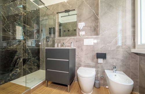 San Giovanni Apartment | The Suitest Rome, cozy apartment for groups a stone's throw from the Colosseum
