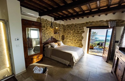 Passignano sul Trasimeno Apartment | Tower- Room with patio with beautiful lake view
