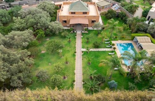 Menara Villa | Villa de Luxe à Marrakech avec Piscine & 7 Suites