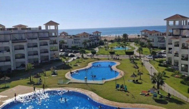 Beachfront Apartment, Private Solarium, 4 Pools, Secure Residence, WiFi, Parking