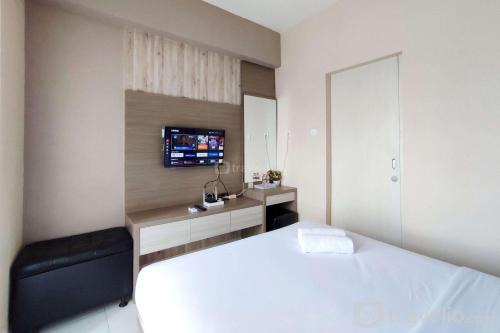Comfortable and Modern 1BR without Living Room at Amartha View Apartment By Travelio in Semarang
