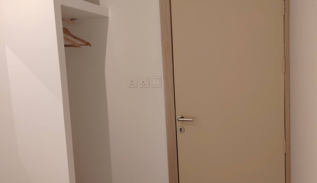 Cozy 1-bedroom hotel with AC and shared bath, lounge,gymroom in lovely Buraydah