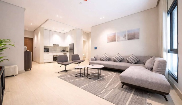 Elegant 2BR Apartment with Self Check-in and Private Parking in Al Rawdah