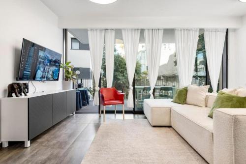 Enchanting Apartment with Pool, Steps from the Beach Bomb Shelter