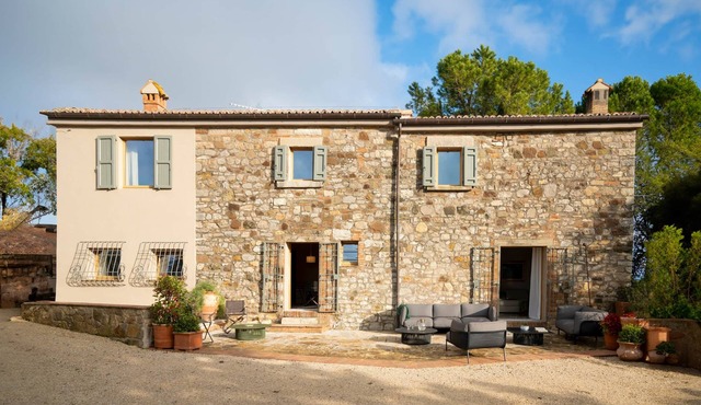 Entire villa with view of the Umbrian countryside