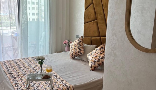 Apartment ecocite zenata 2 steps from the beach in residence with swimming pool