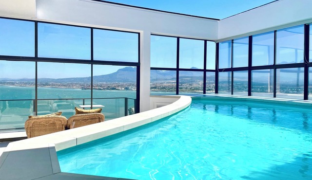 Stunning ocean view mountainside house with indoor heated pool in Cape Town
