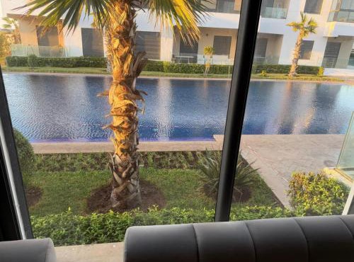 Superbe appartement 120 mc, Plage à pieds, 3 piscines & calme garanti - Sidi Rahal Plage