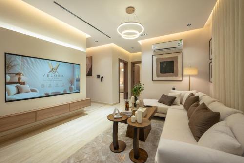 Velora Living Royal 2BR Apartment 70 TV