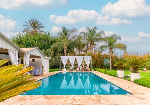 Villa de Luxe à Marrakech avec Piscine & 7 Suites