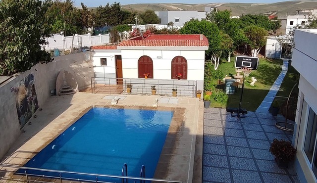 Villa NAIMA LARACHE WITH SWIMMING POOL, located in a quiet area close to the beach.